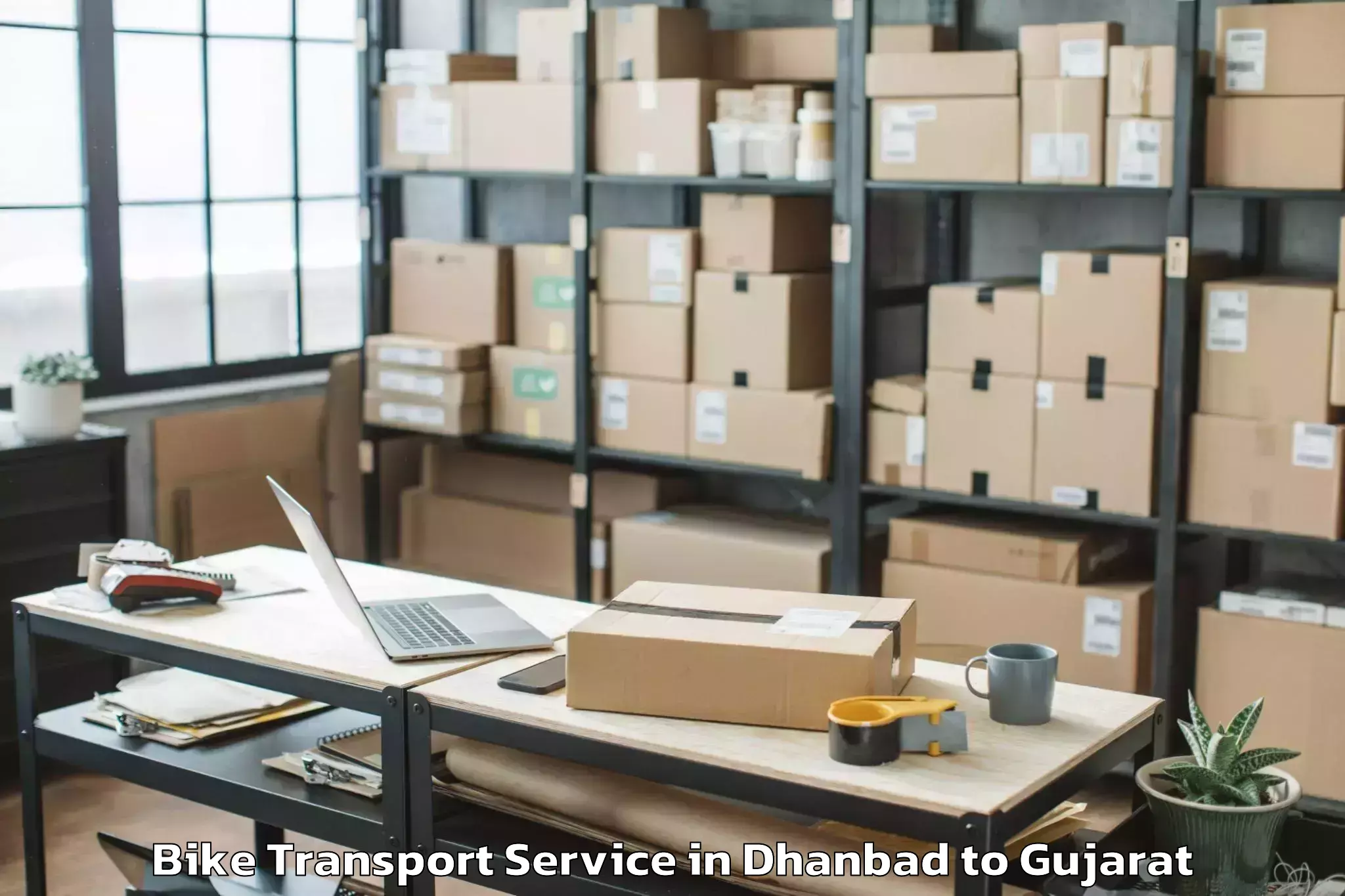 Book Dhanbad to Kandla Bike Transport Online